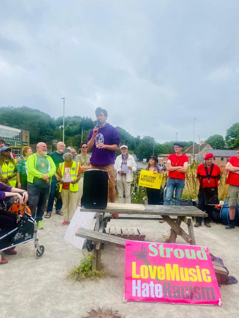 Young man speaking at rally